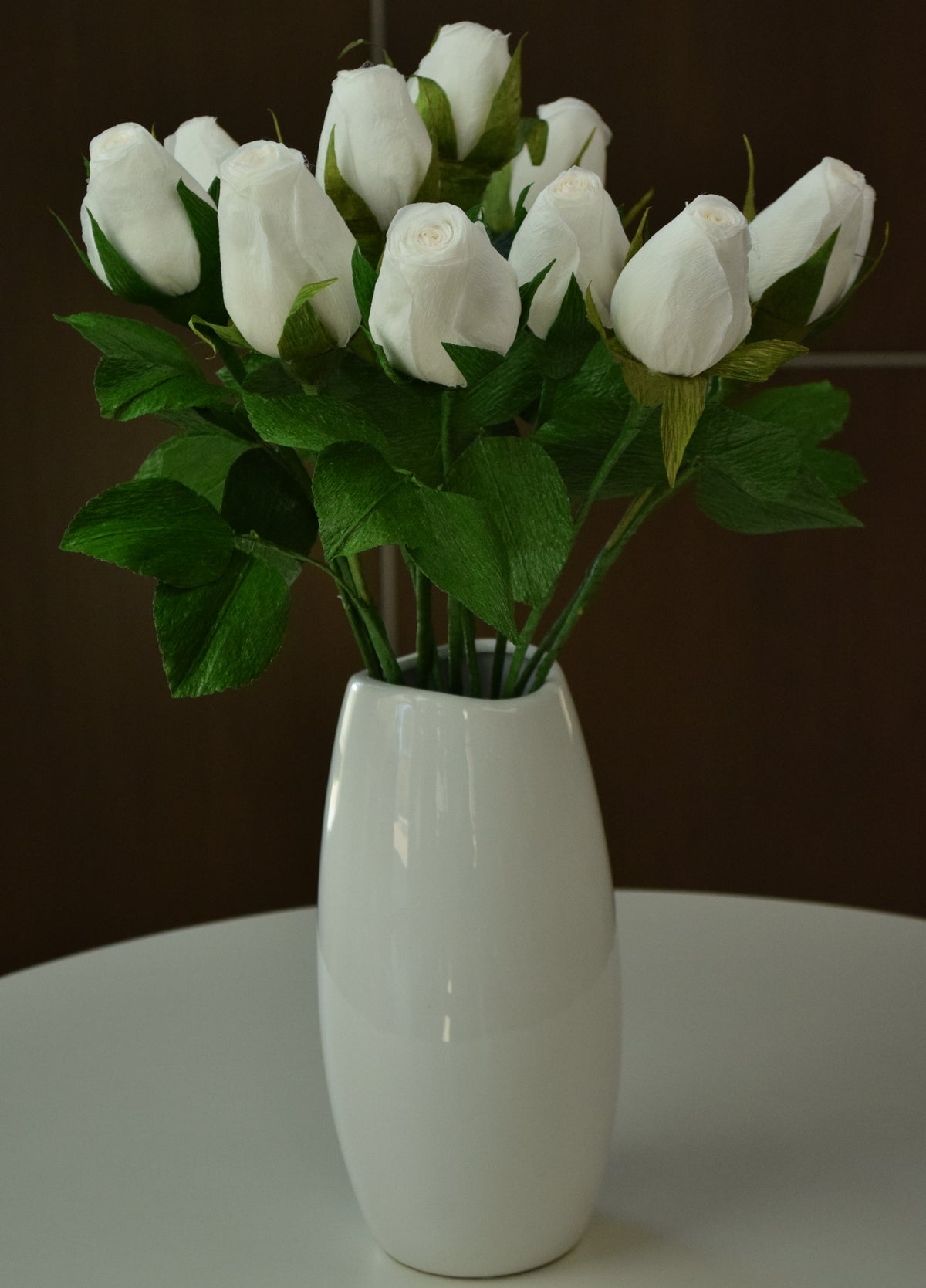 Dozen white hybrid roses